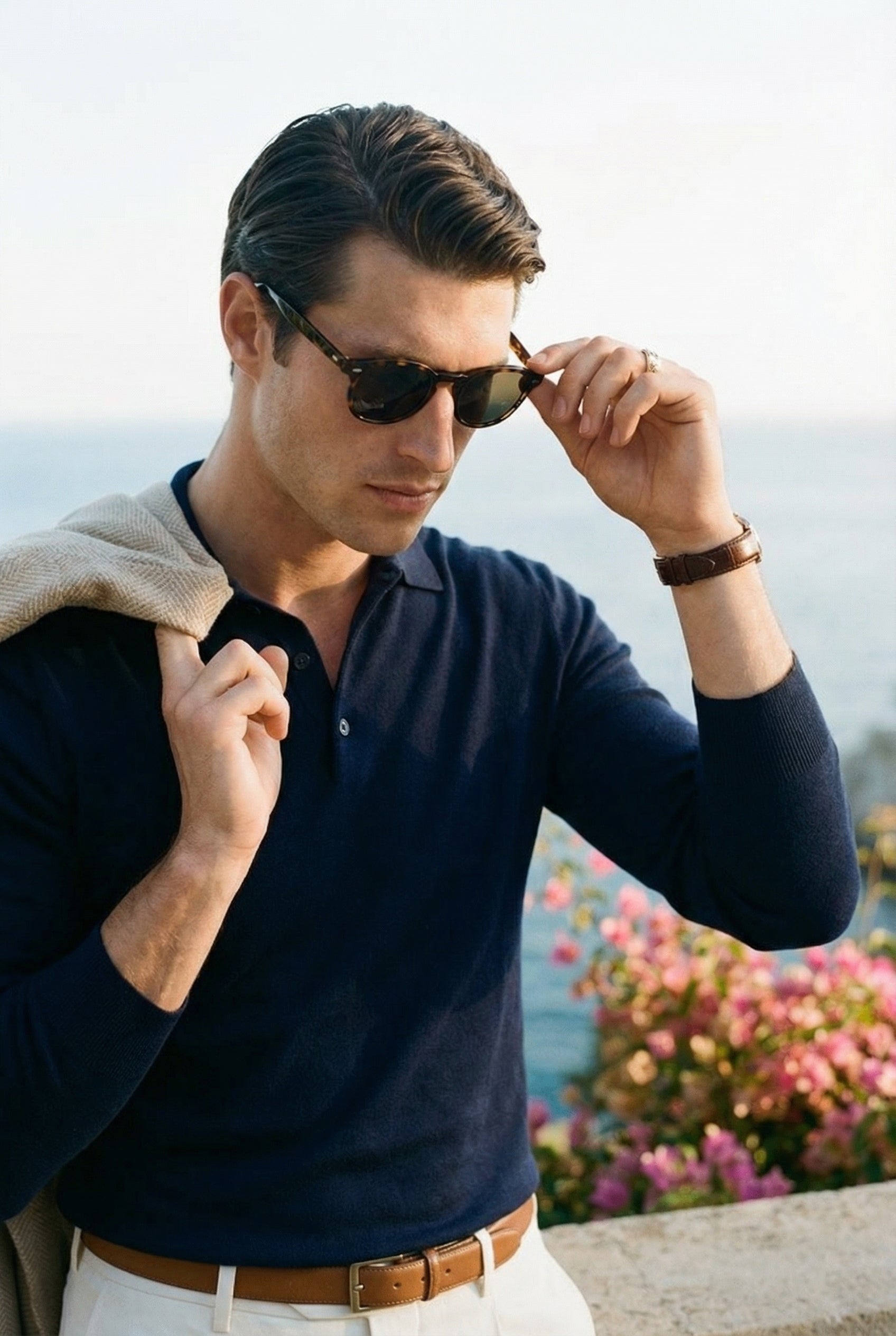 Gebreide polo met knoopsluiting van effen lamswol in 'old money'-stijl