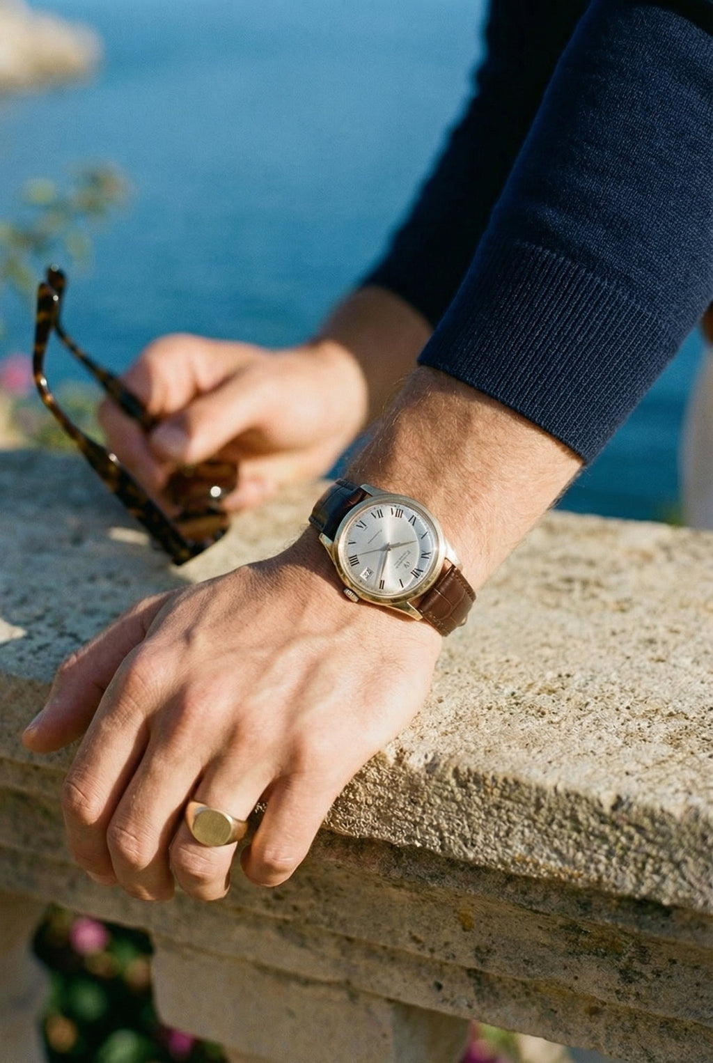 Gebreide polo met knoopsluiting van effen lamswol in 'old money'-stijl